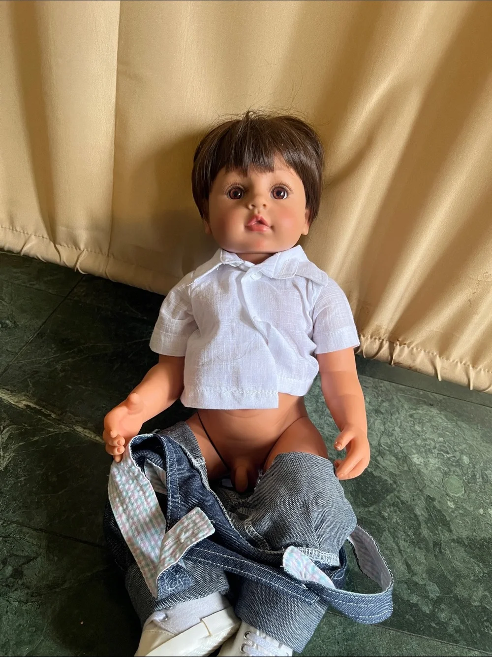 Realistic Baby Doll in Blue Denim Overalls with White Shirt